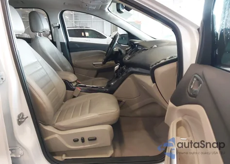 2016 Ford Escape Titanium z USA, uszkodzony, nr VIN 1FMCU0J92GUA29836